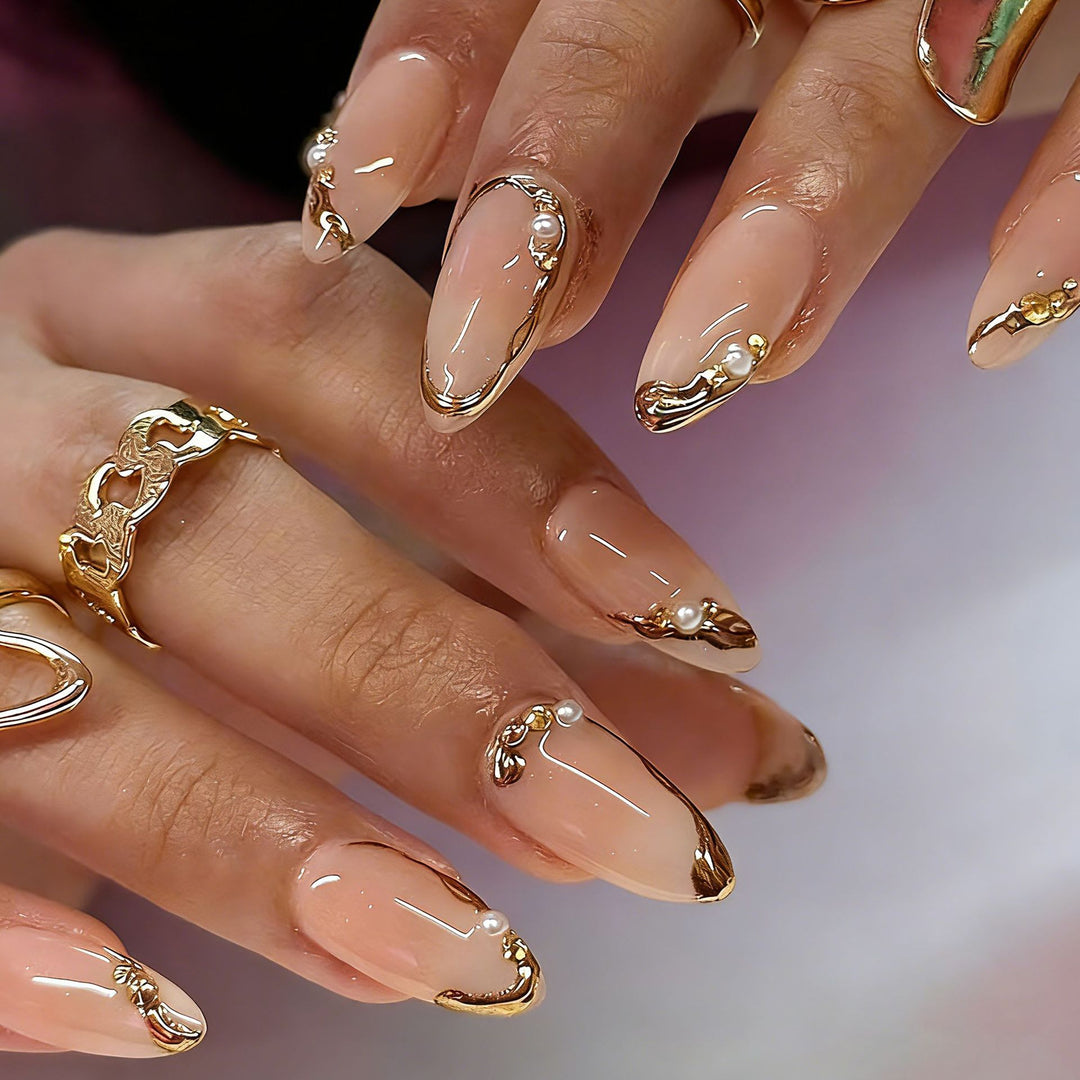 Elegant artificial nails with golden accents Bowlift