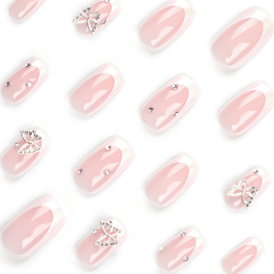 Elegant Nail Art with Glitter and Floral Accents Bowlift