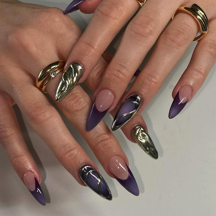 Artful stiletto nails with elegant gold and ombre design Bowlift