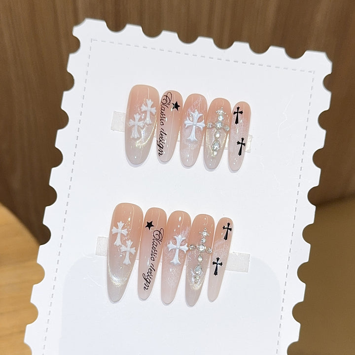 Artificial nail tips with cross and glitter motifs Bowlift