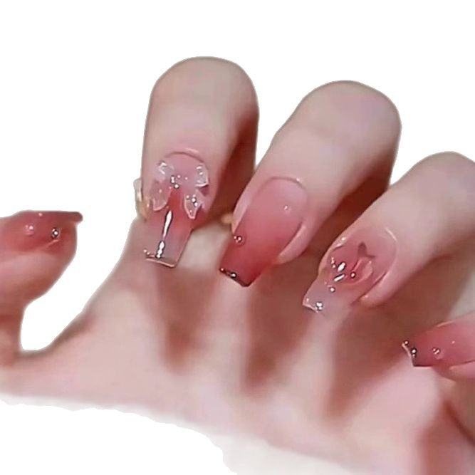 Elegant nail design with pearl embellishment Bowlift