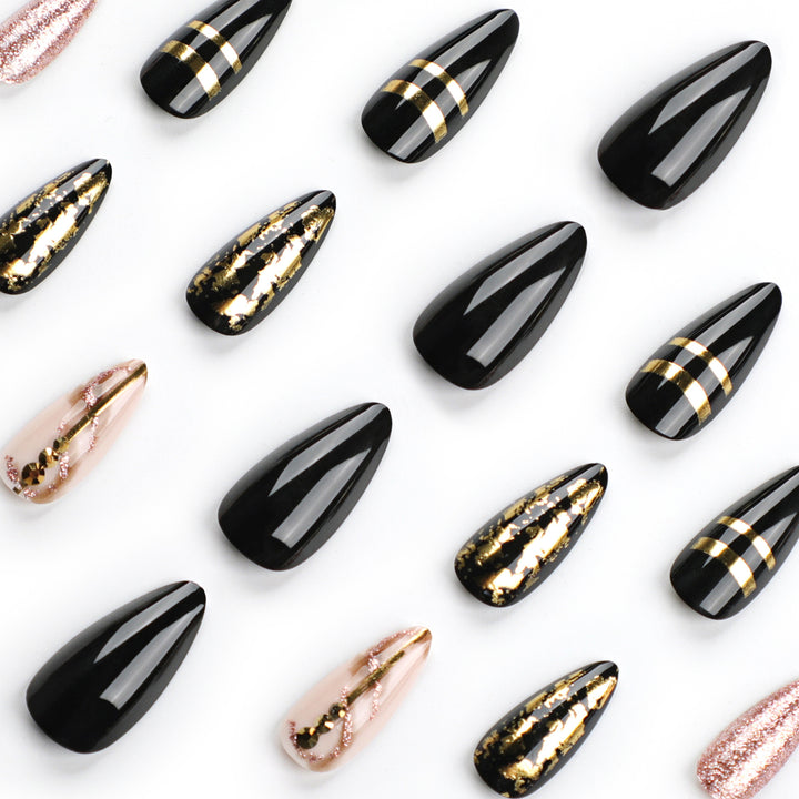 Glamorous stiletto nails with golden accents Bowlift