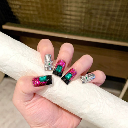 Glamorous Press-On Nail Design with Jewel Accents Bowlift