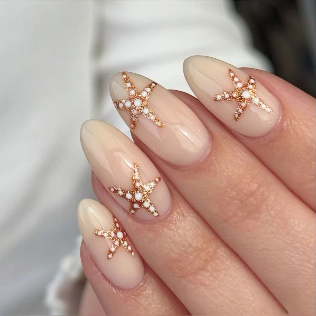 Glamorous stiletto nails with elegant star design Bowlift