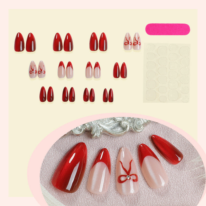 Designer artificial nails with elegant bow decoration Bowlift