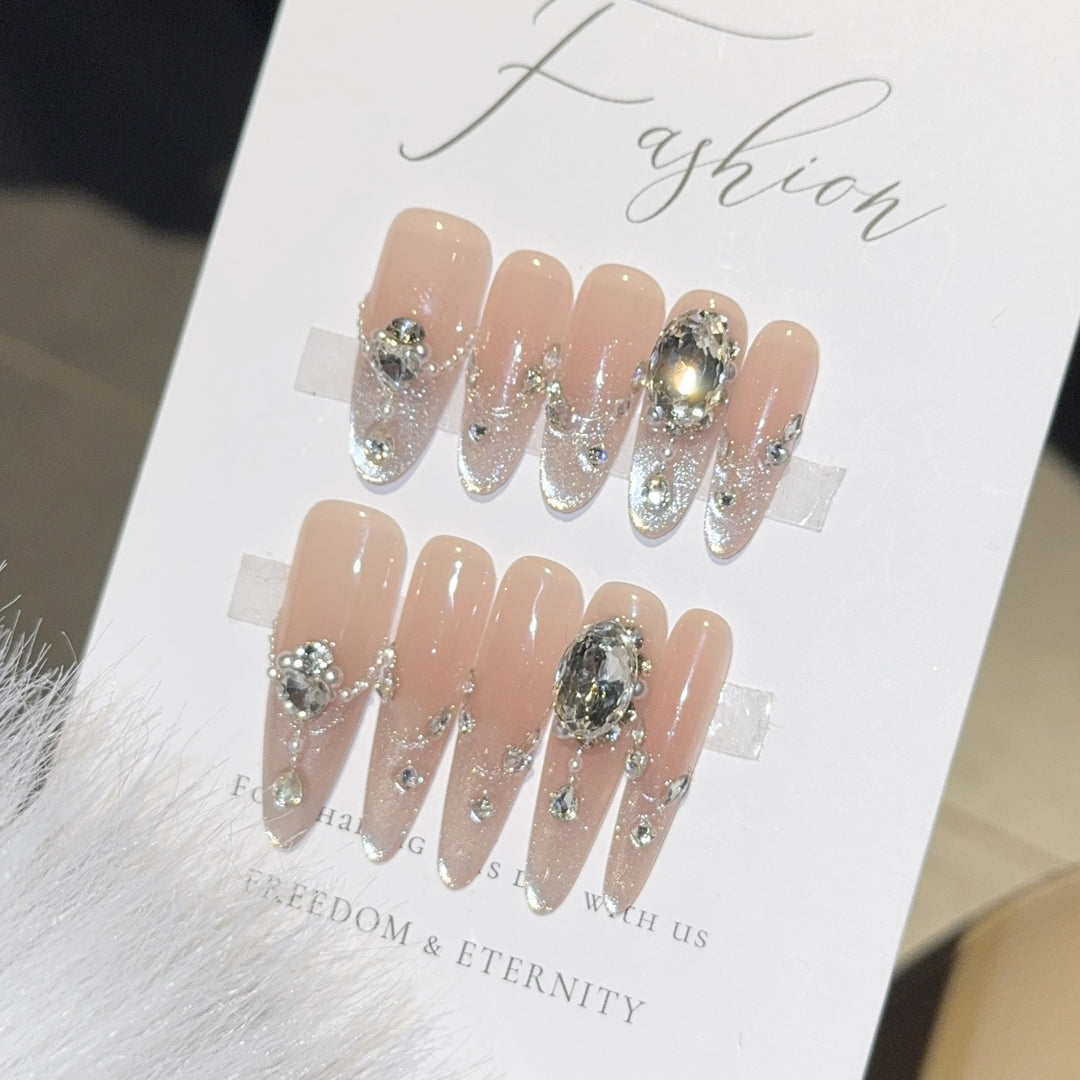 Glamorous artificial nail tips with rhinestone accents Bowlift