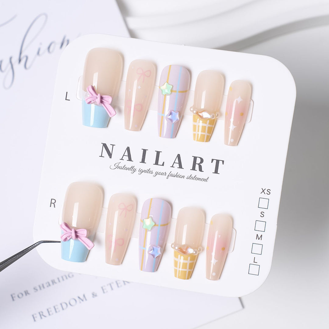 Artistic Stiletto Press-On Nail Set with Floral Embellishments Bowlift