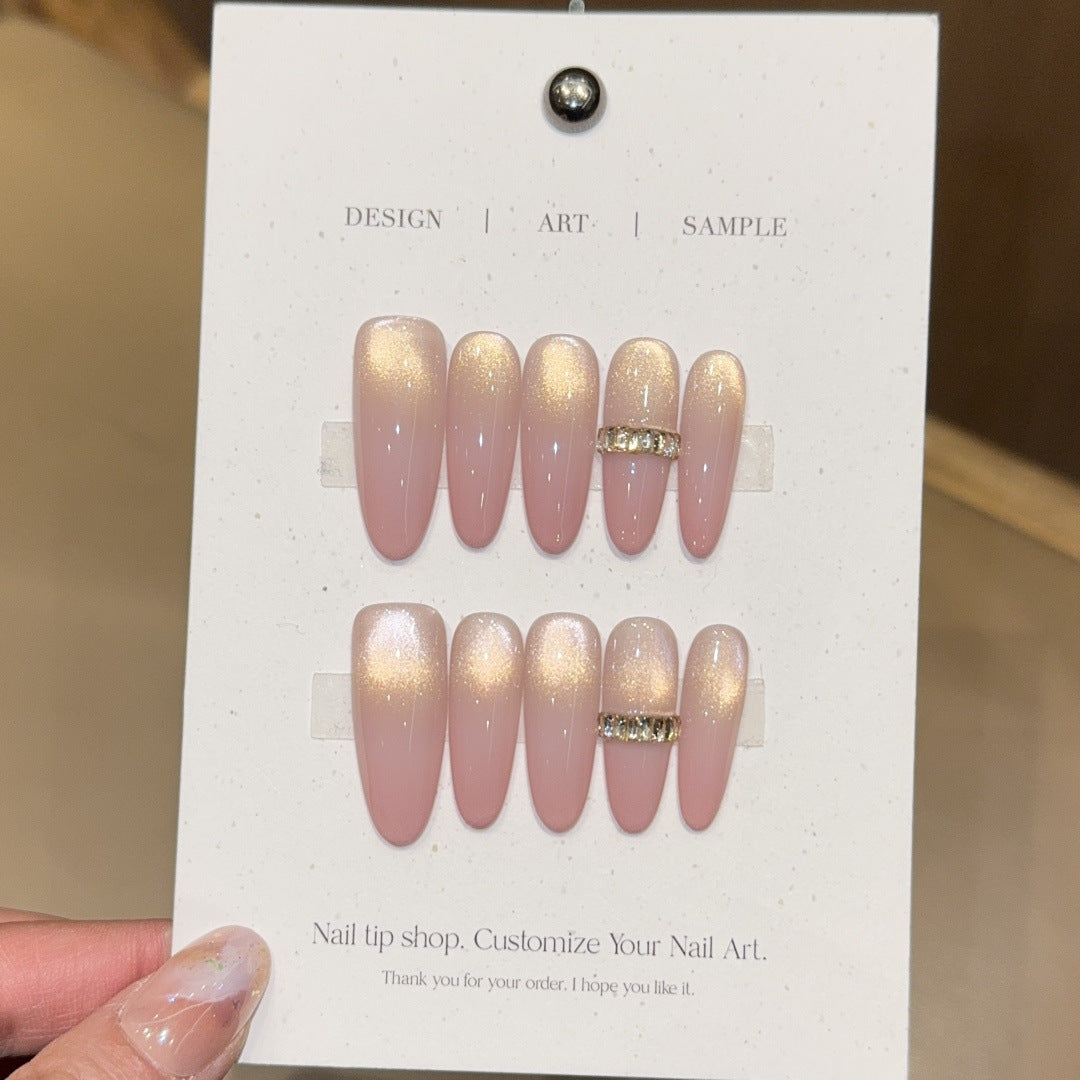 Glamorous artificial nails with elegant glitter and rhinestone application Bowlift