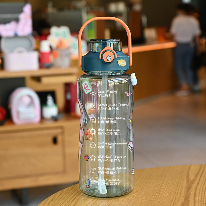 Women’s water bottle with integrated time marking and practical carrying handle Bowlift
