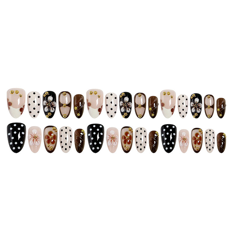Art nail set with floral accents and elegant 3D decorations Bowlift