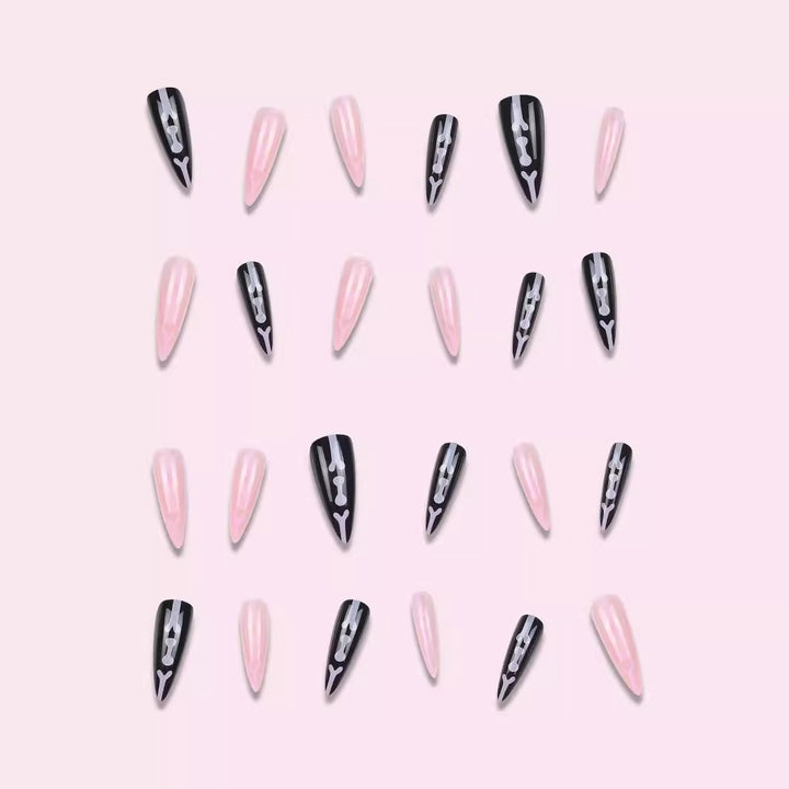 Artistic Stiletto Press-On Nails with Bone Design Bowlift