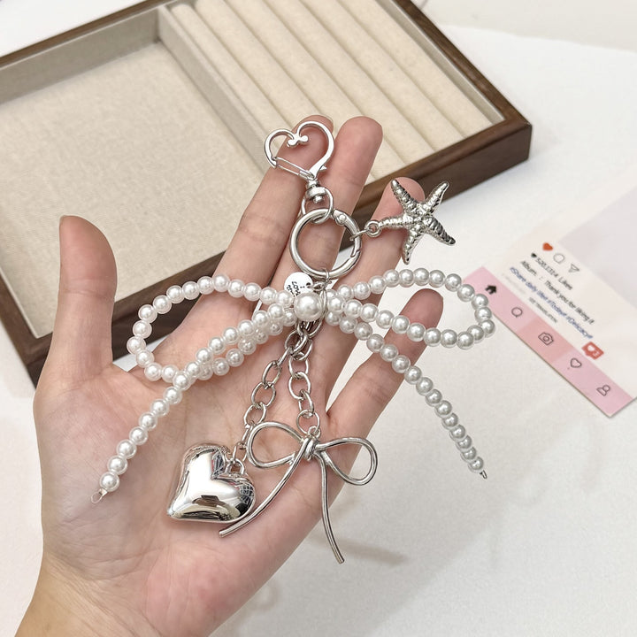 Pearl and Bow Charm Keychain Bowlift