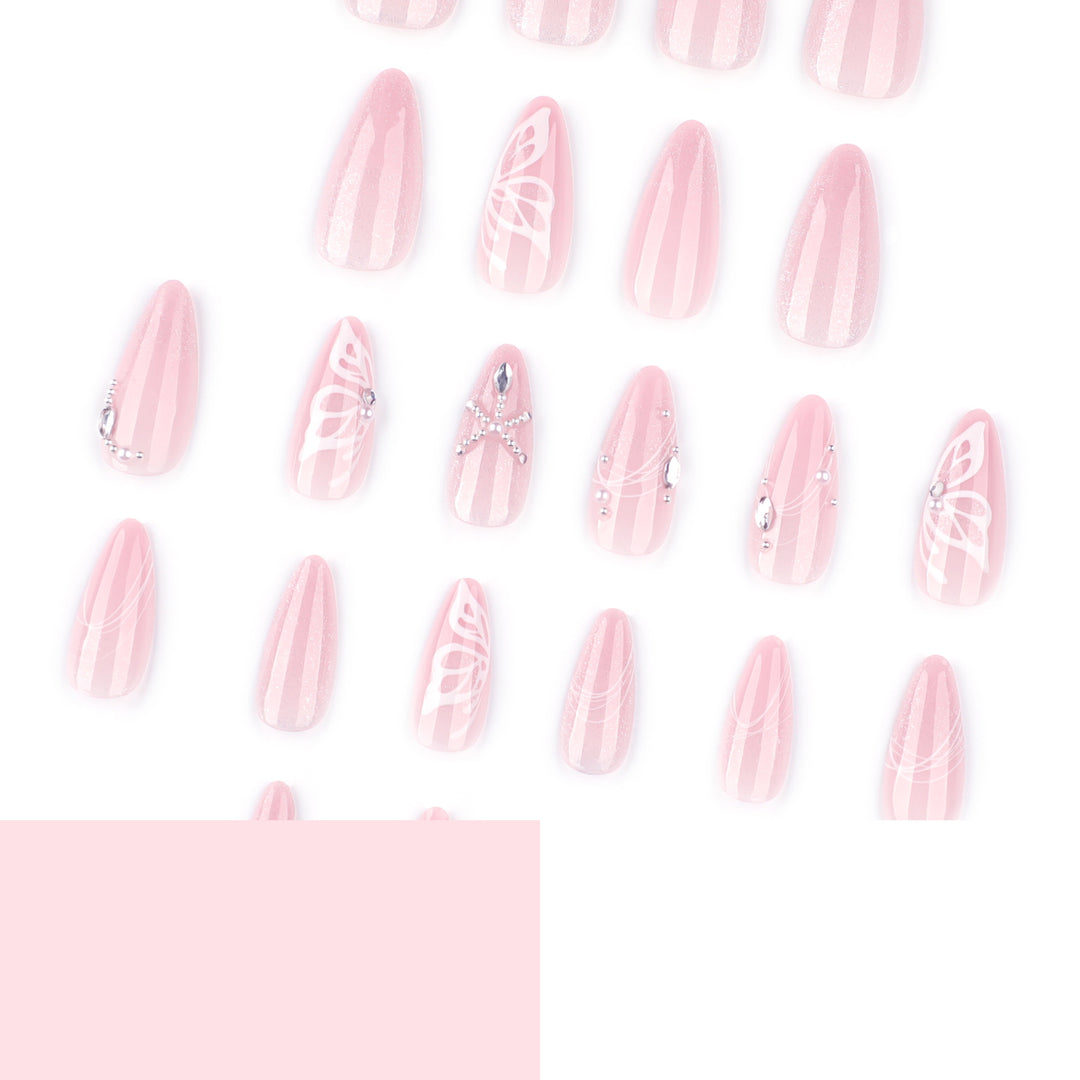 Artful nail extensions with delicate flower and glitter accents Bowlift