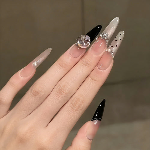 Artificial nail set with elegant glitter and 3D applications Bowlift