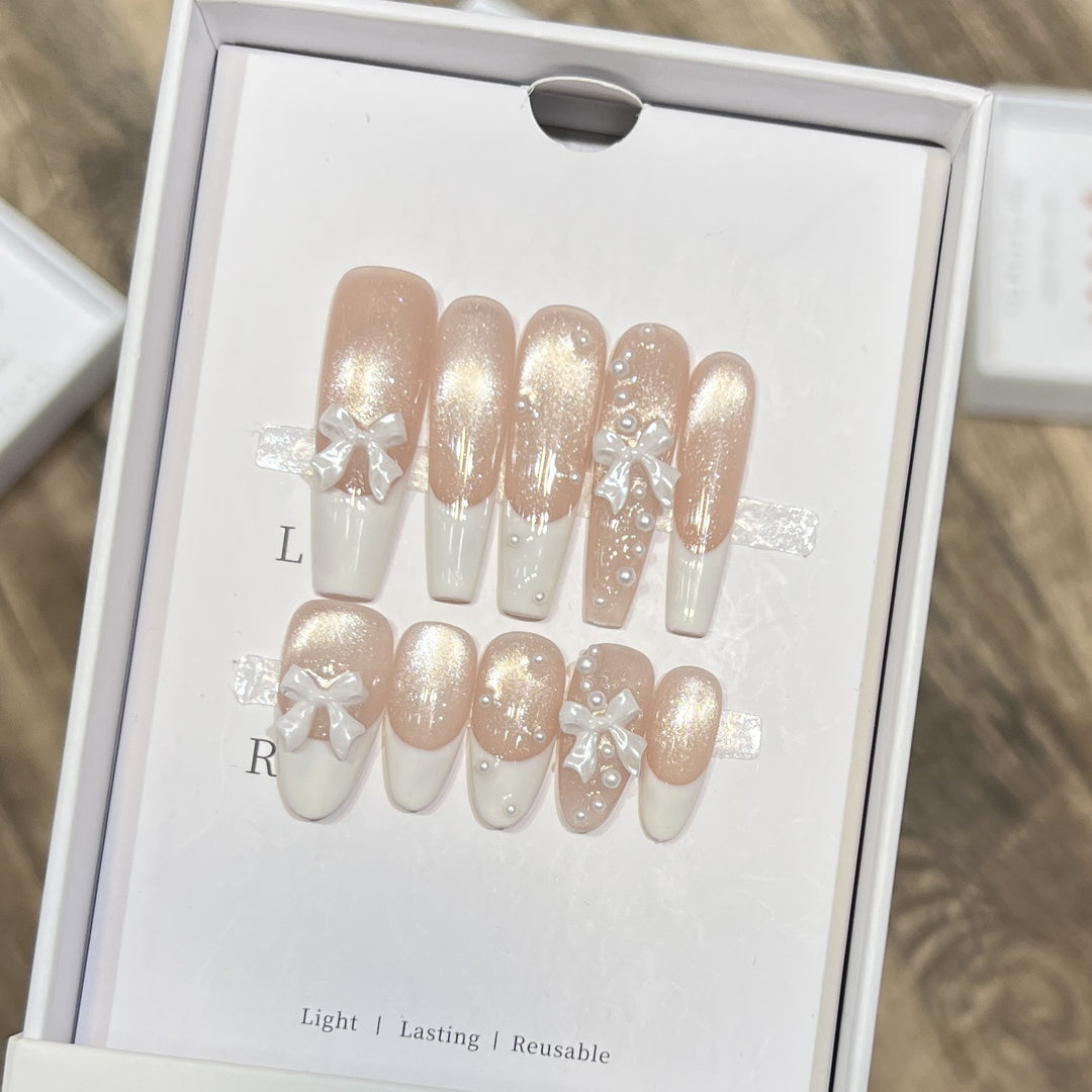 Decorative Long Press-On Nail Set with Bow and Pearl Accents Bowlift
