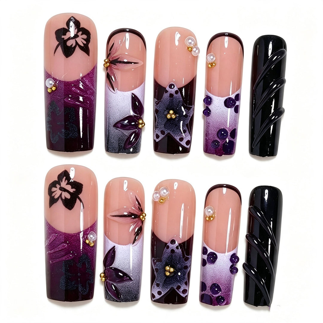 Artistic Long Nail Design with Floral Accents Bowlift