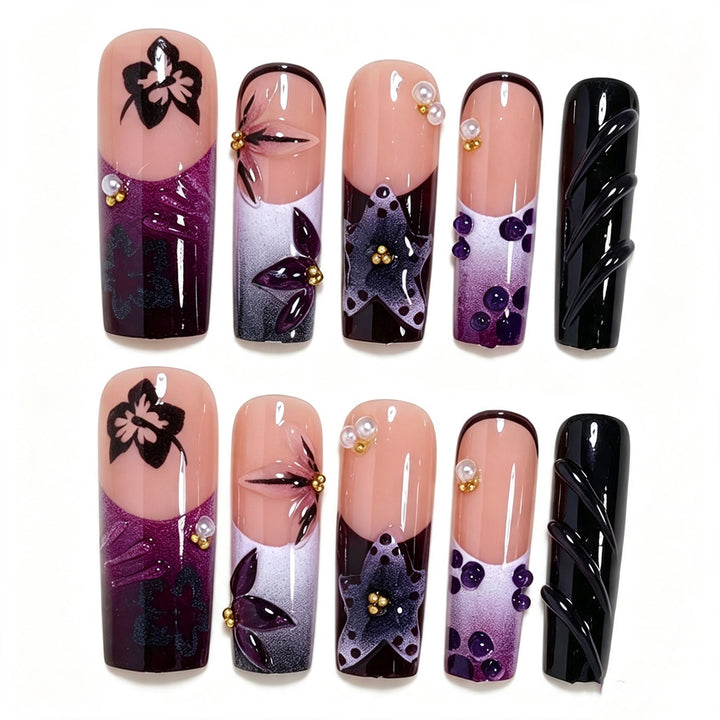 Artistic Long Nail Design with Floral Accents Bowlift