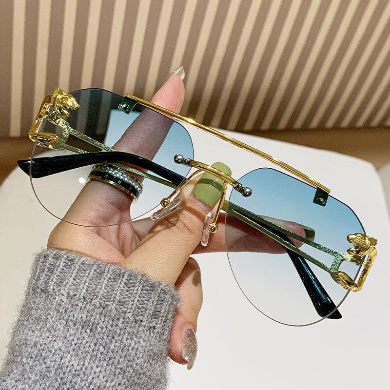 Women Designer Sunglasses with Unique Animal Accent Bowlift