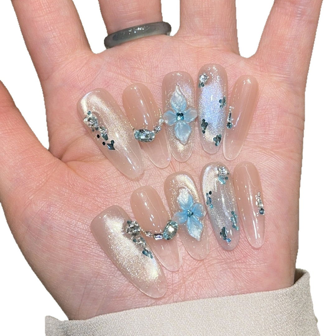 Artificial nails with unique floral design and glitter accents Bowlift