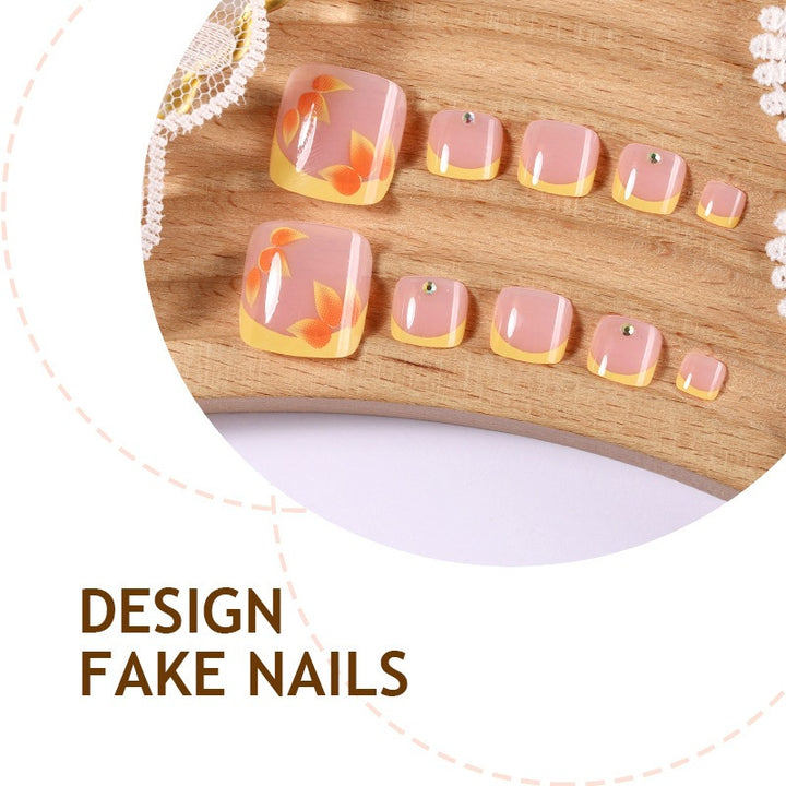 Artificial nail set with floral design and glitter accents Bowlift