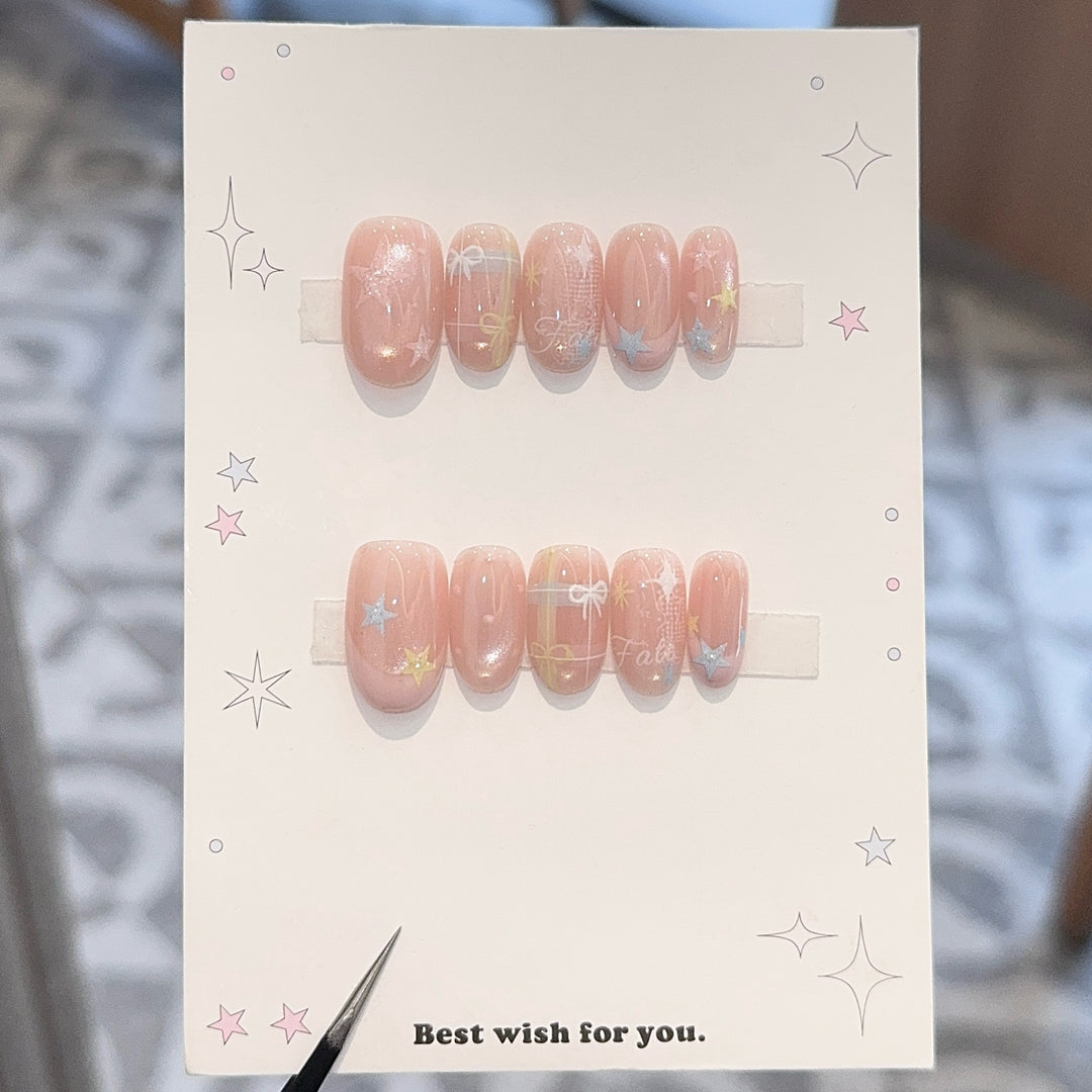 Artificial nails with romantic star and glitter motifs Bowlift