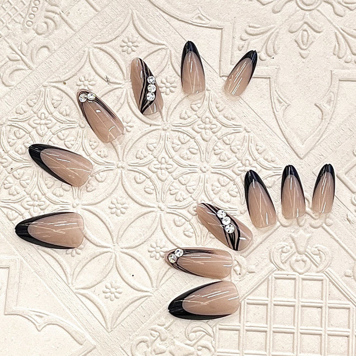 Elegant Press-On Nail Design with Rhinestone Accents Bowlift
