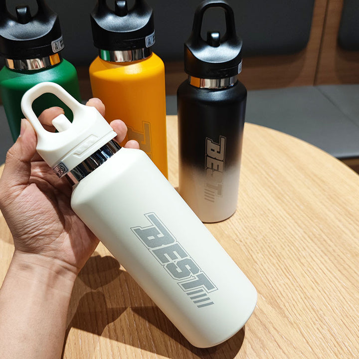 Women's sustainable stainless steel water bottle with leak-proof lid and handle Bowlift