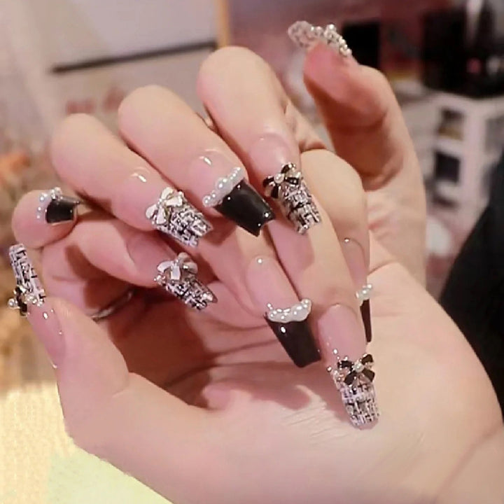 Decorative Press-On Nail Art with Elegant Black Tips Bowlift