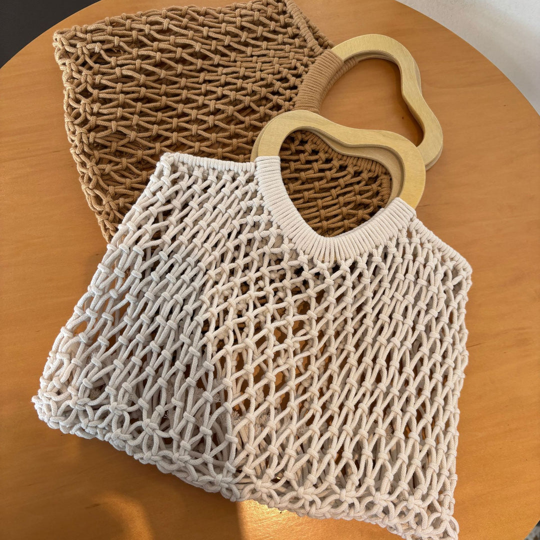 Stylish handbag with heart-shaped handle Bowlift