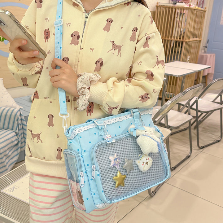 Handbag with Transparent Compartment Division and Playful Application Design Bowlift