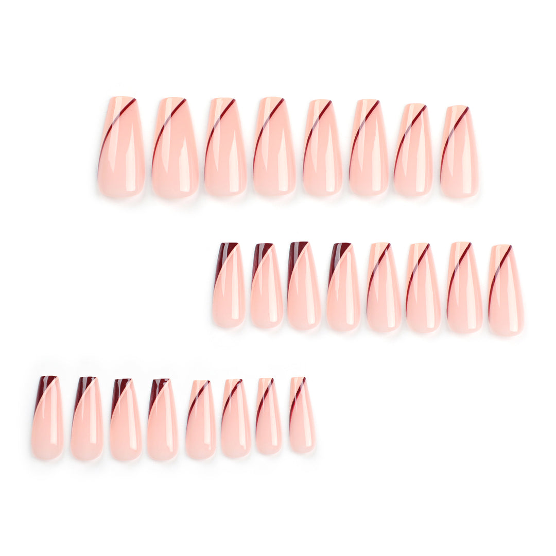 Artful stiletto nails with elegant gradient and geometric accents Bowlift