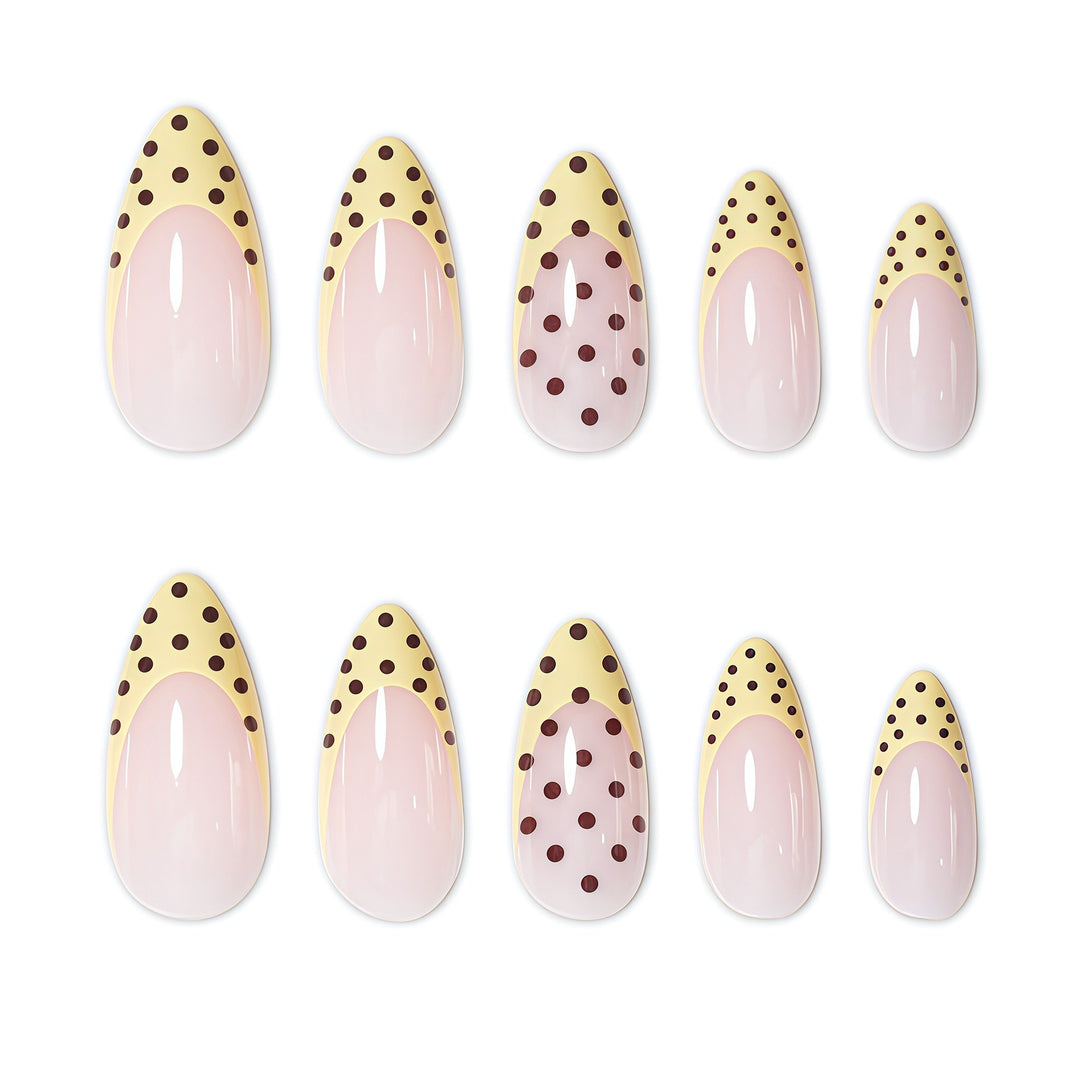 Elegant French Tip Nail Enhancements with Polka Dot Design Bowlift