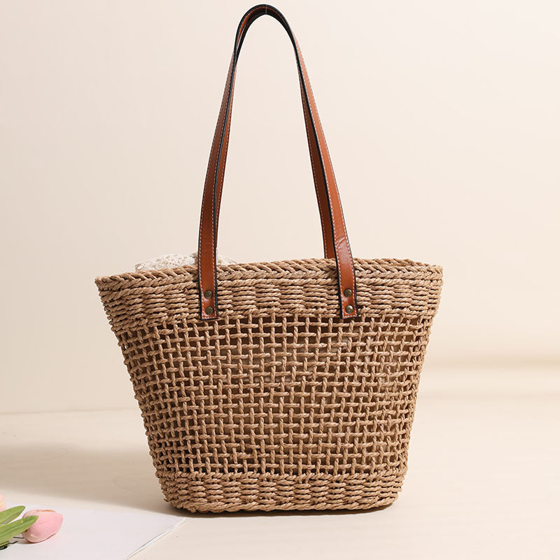 Handmade straw bag with elegant leather accents Bowlift