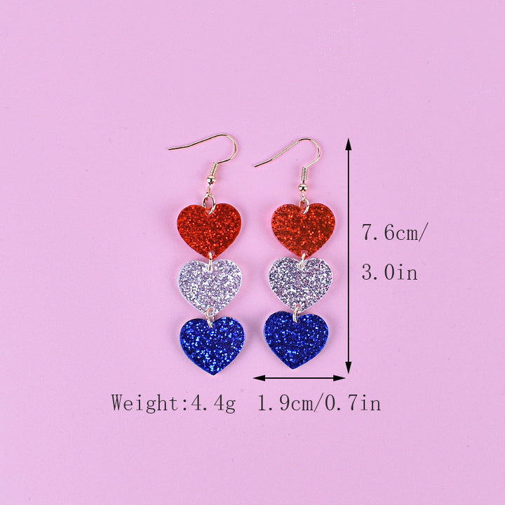 Women's long star pendant earrings made of glitter resin with three-tier chain suspension and fishhook bowlift