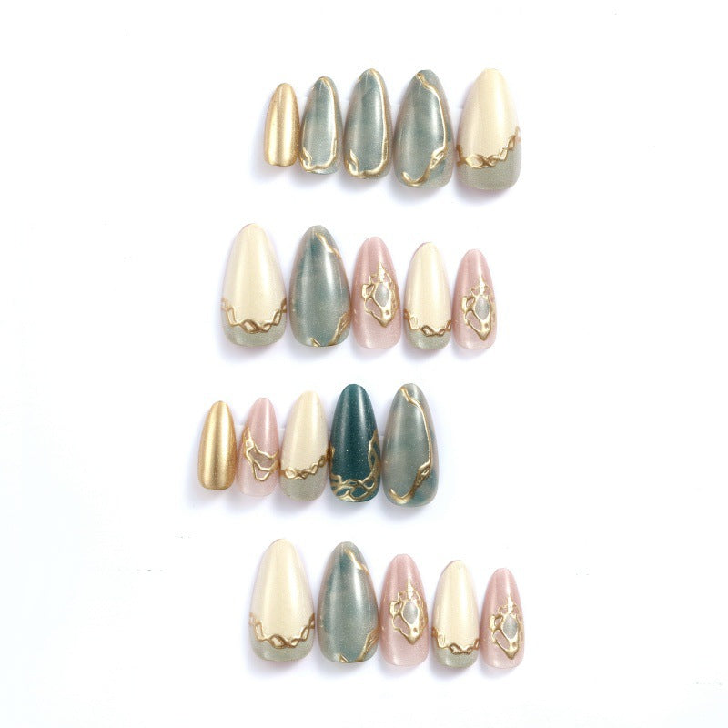 Artificial nails with elegant golden accents Bowlift
