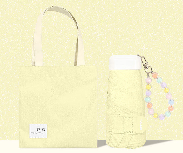 Women’s tote bag with integrated folding umbrella Bowlift