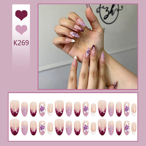 Artificial nails with elegant ombre effects and floral accents Bowlift
