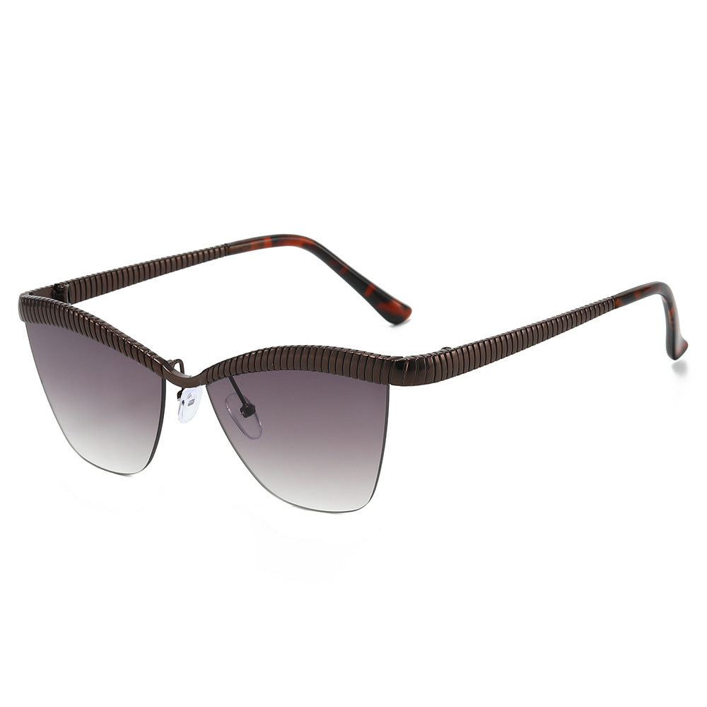 Modern Cat-Eye Sunglasses with Decorative Textured Frames Bowlift