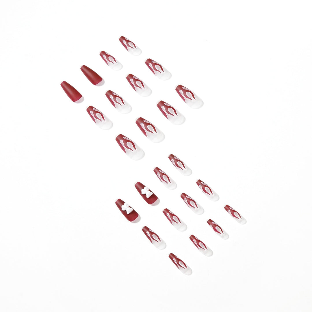 Artful stiletto nails with fiery flame design Bowlift