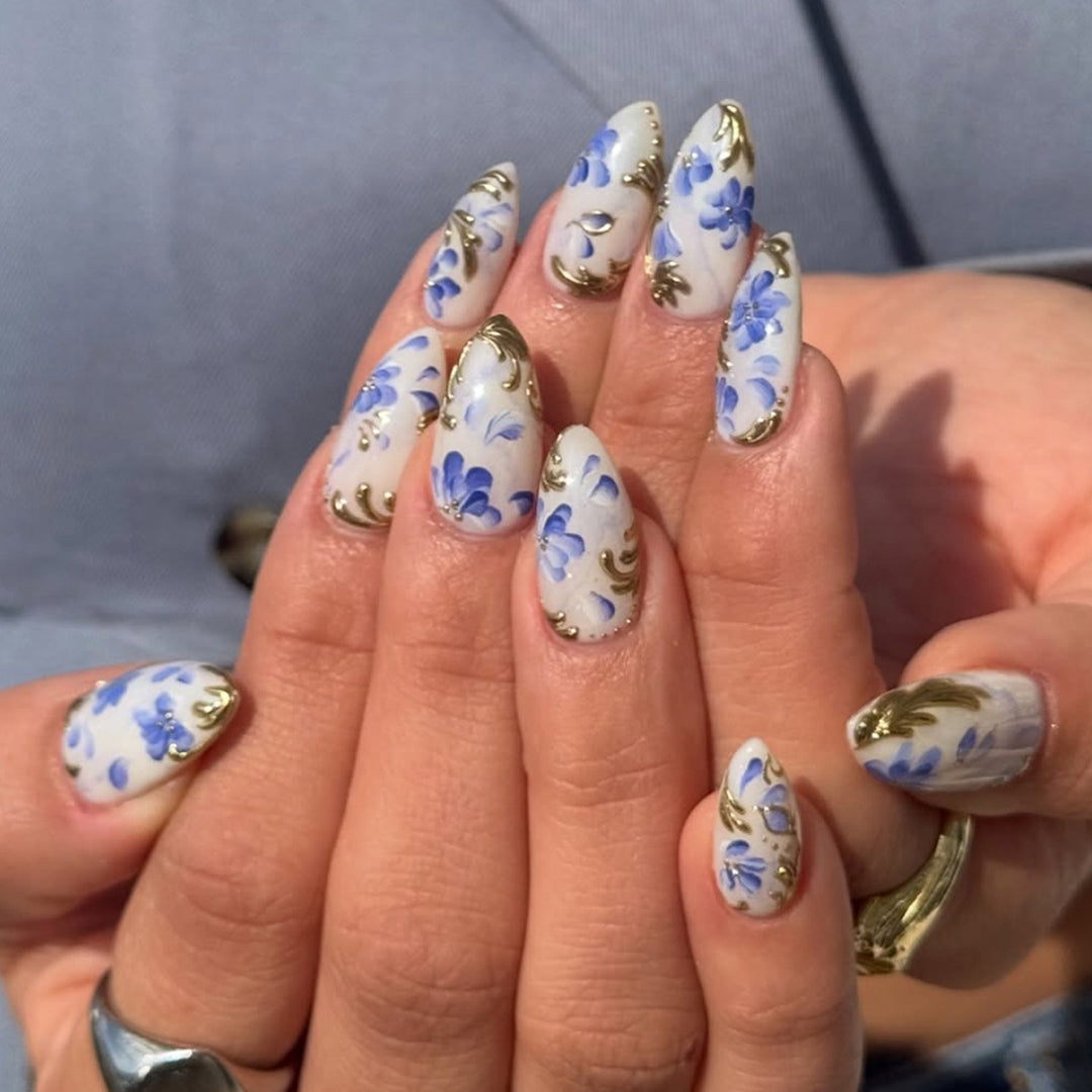 Artificial nails with exquisite floral and gold accents Bowlift