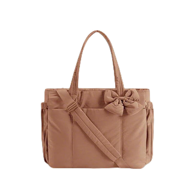 Multifunctional tote bag with detachable shoulder straps and decorative bow Bowlift