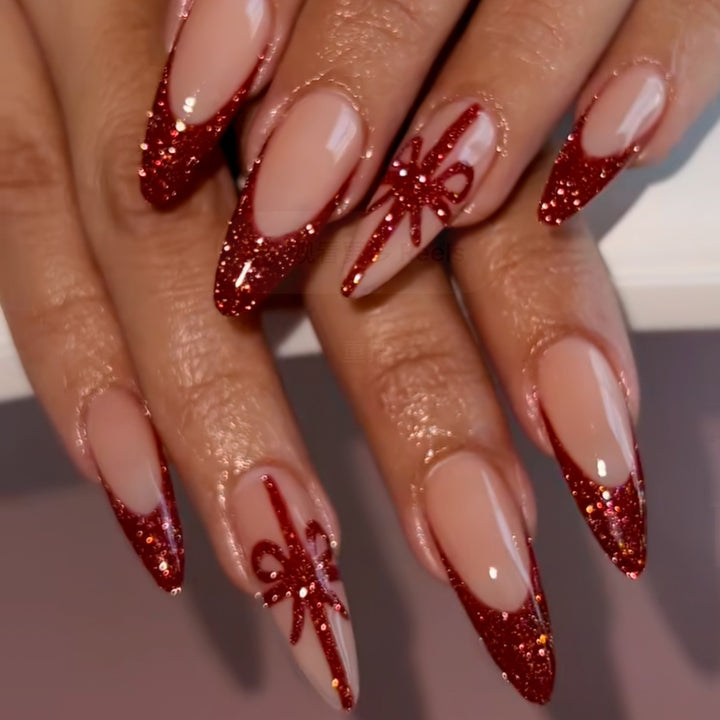 Nail set with glamorous glitter accents and bow design Bowlift