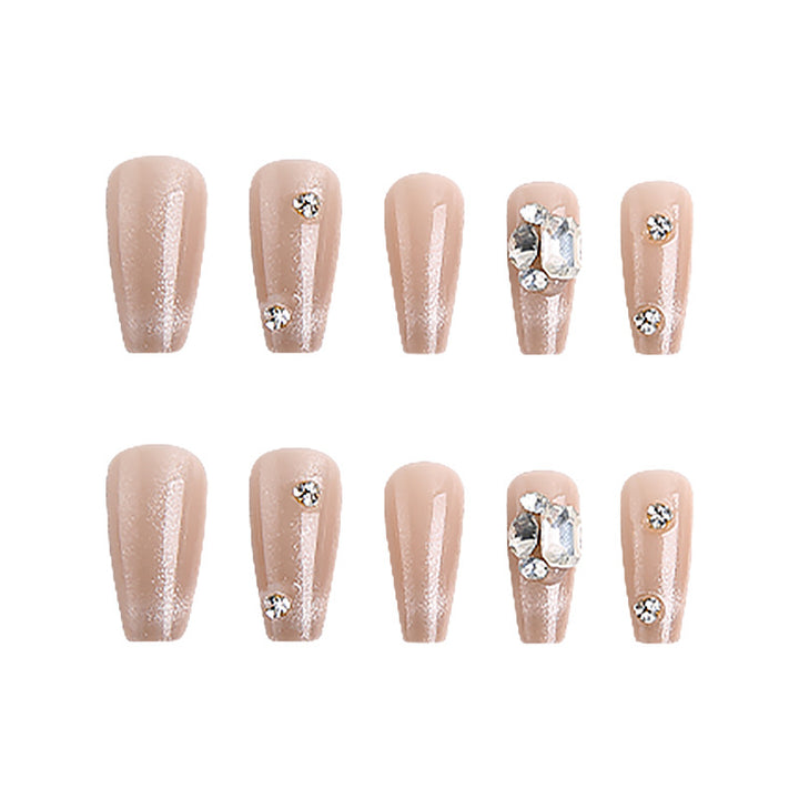 Acrylic nail set with glamorous glitter accents and elegant jewelry embellishments Bowlift