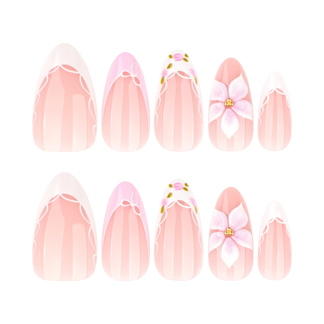 Artful nail extensions with delicate floral pattern and elegant accents Bowlift