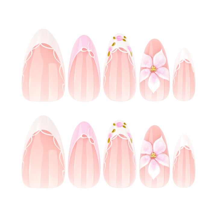 Artful nail extensions with delicate floral pattern and elegant accents Bowlift