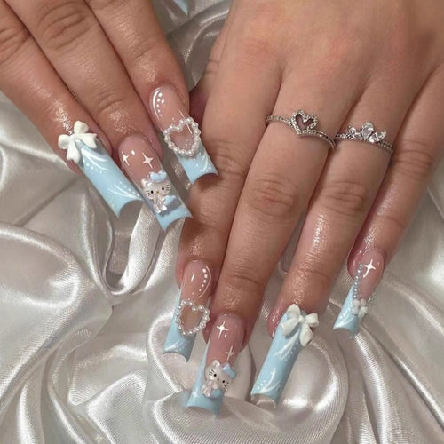 Artificial nail set with playful 3D accents Bowlift