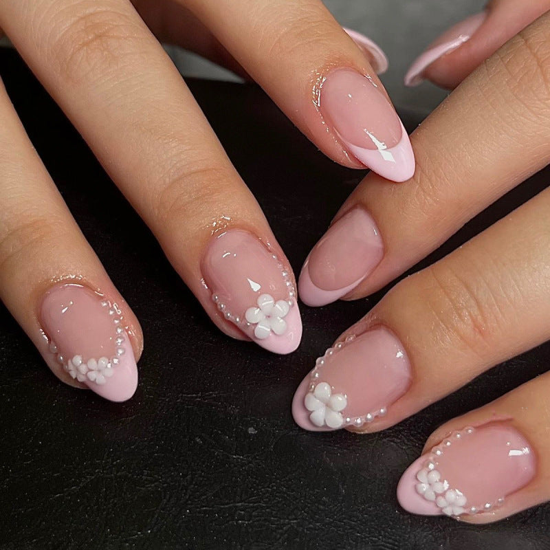 Artful Nail Art with Flower Design and Blue French Tip Bowlift