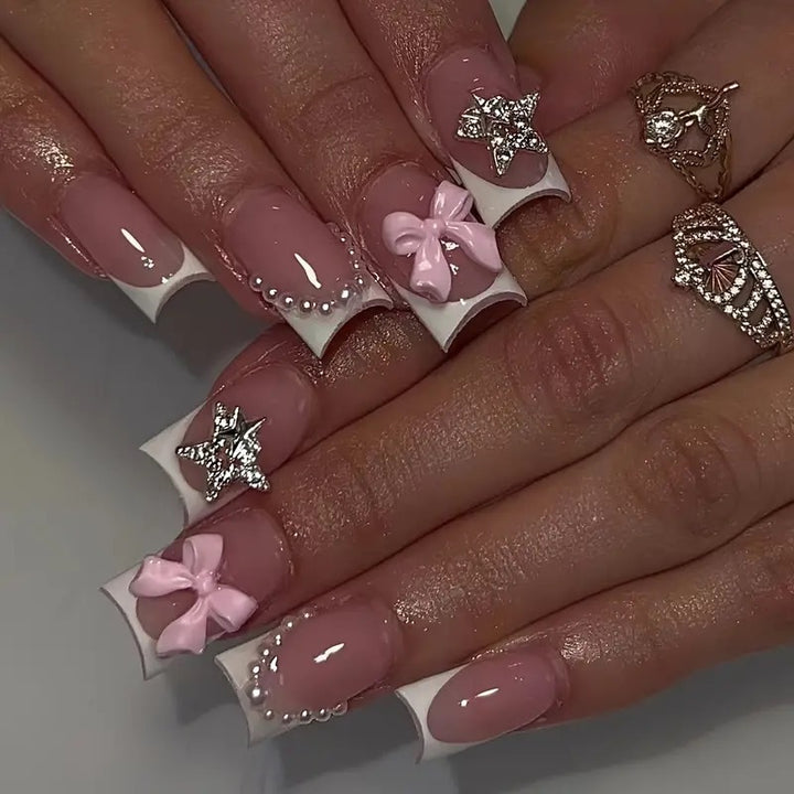 Artificial nail tips with glamorous bow and rhinestone design Bowlift