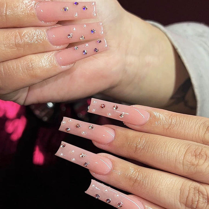Acrylic nail set with sparkling rhinestone embellishments Bowlift