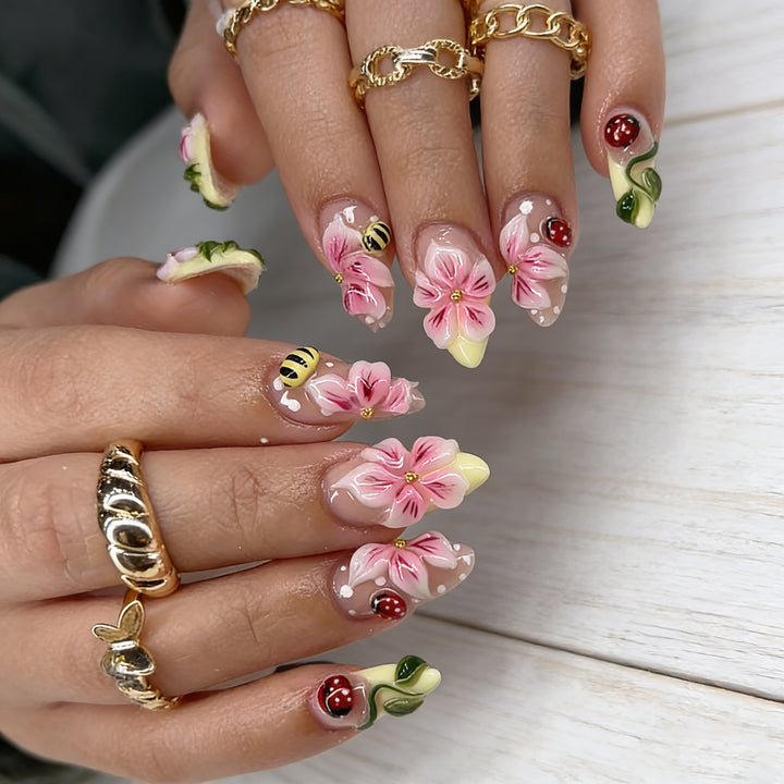 Artificial nail set with floral 3D applications and gloss finish Bowlift